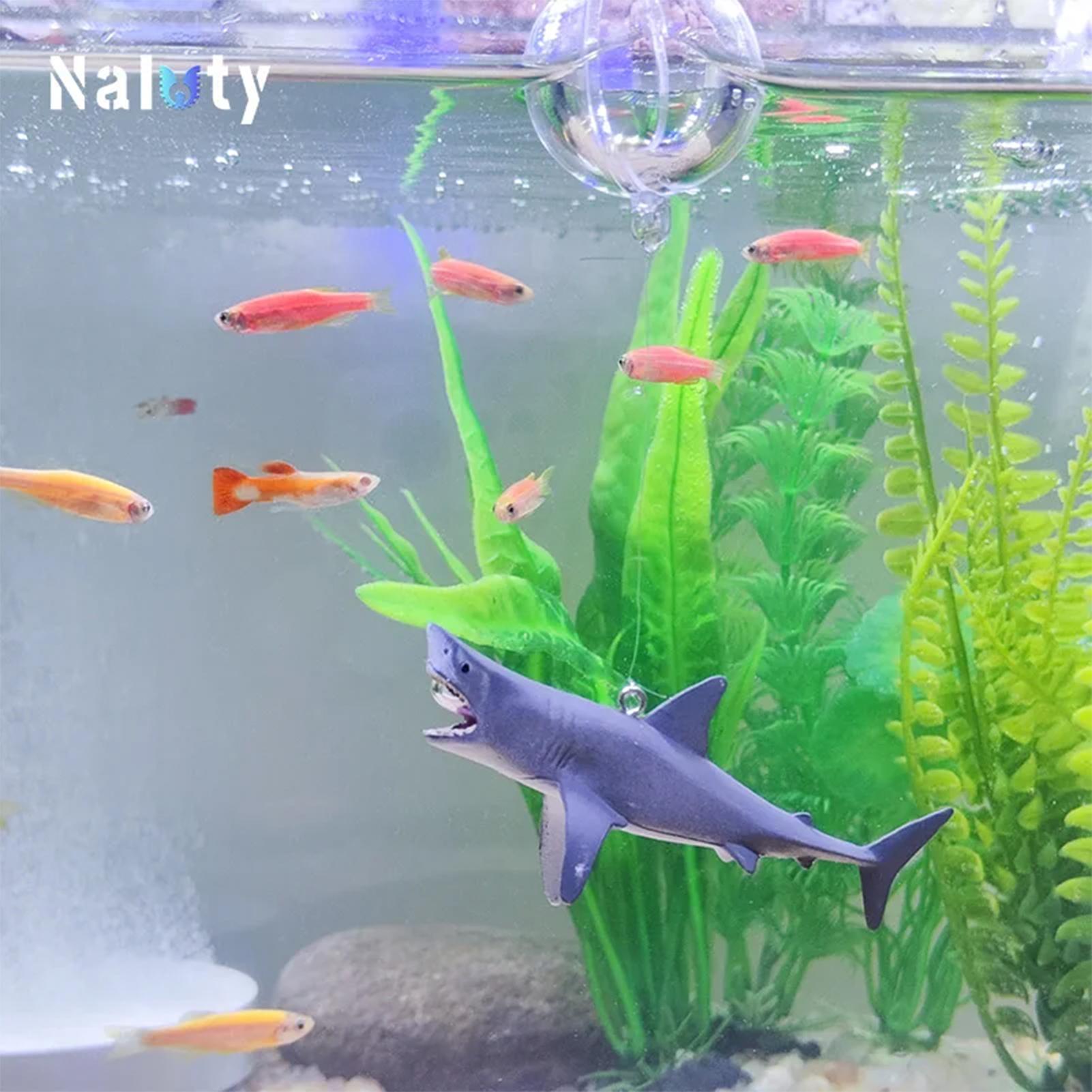 ديكور المناظر الطبيعية لحوض سم - مراجعة Aquarium Fish Games وسعره